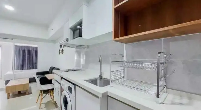 Comfort and Simply Look 1BR Tamansari Bintaro Mansion Apartment By Travelio, Book Apartment Hotels in South Tangerang with a Pool, Swimming Pool