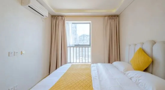 Люкс с видом на море Yuepeng Boutique Apartment (Dalian Harbour Plaza)