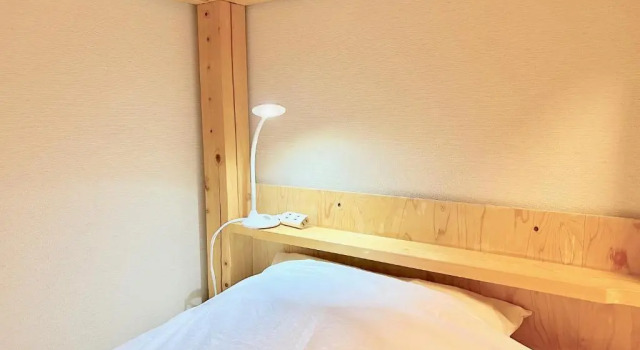 Кровать в общем номере Glocal Nagoya Backpackers Hostel