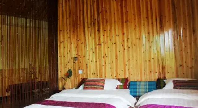 Семейный люкс Mengla Bajiaolou Inn