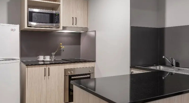 Апартаменты Deluxe Oaks Sydney North Ryde Suites