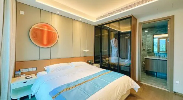 Кровать в общем номере Junshan Holiday Hotel