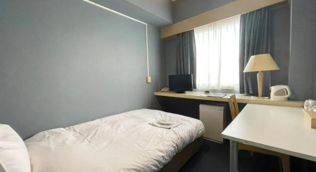 Кровать в общем номере (мужской номер) Fukuyama Royal Hotel