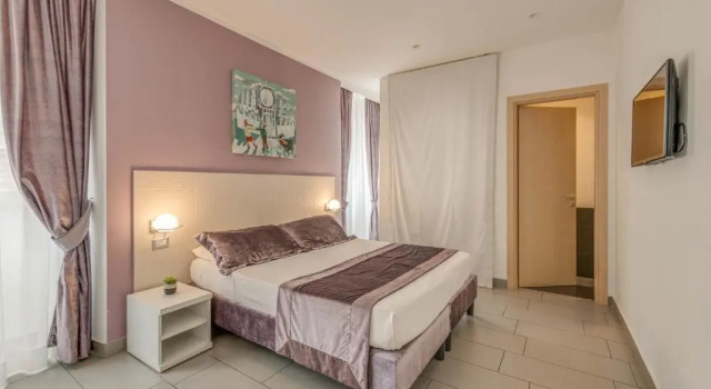 Четырёхместный номер Trevi Palace Hotel
