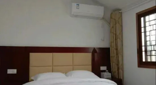 Hongyun Homestay, Prenota Hotel Hotel a Chizhou con parcheggio, Parcheggio
