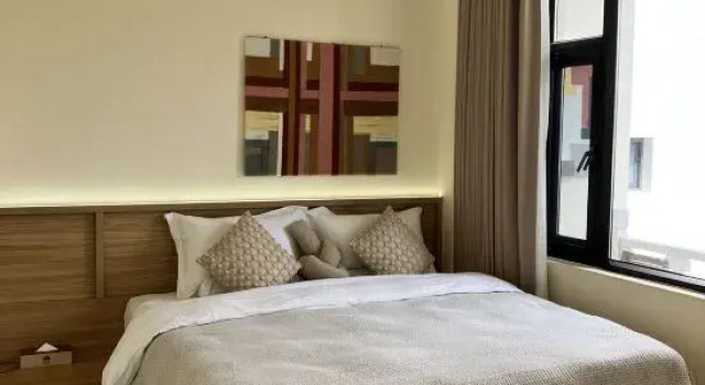 Четырёхместный семейный люкс Luxury с балконом Dali Green Gables Garden Hotel