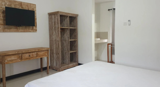 Номер Deluxe Kanha Homestay near Pantai Pandawa RedPartner