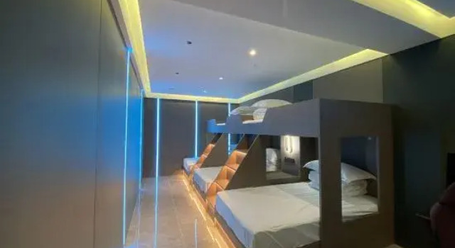 Кровать в общем номере Four Seasons E-sports Viewing Movie Smart Selection Hotel (Gushi Chengnangen Culture Park)
