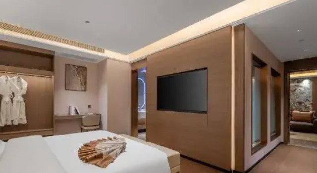 Люкс Deluxe Gelaimu Hotel (Qujing Shizong)
