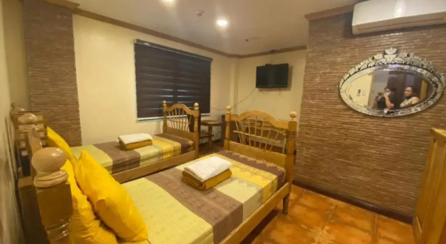 OYO 797 Brickwood Suites, Забронировать Отель Манила 