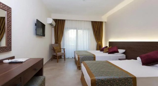 Трёхместный номер Alaaddin Beach Hotel