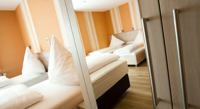 Четырёхместный номер Comfort с балконом Haus Hubertus