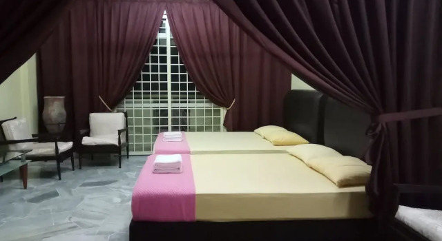 Номер Deluxe с 4 комнатами с балконом и с видом на сад Rose Condo@ Cocobay Beach Resort