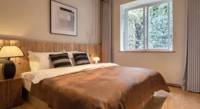 Кровать в общем номере Dali Xingmai Mountain and Sea View Homestay (Erhai Branch)