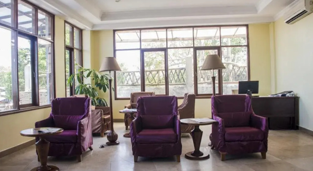 Millennium Old Post Office Hotel, Buchen Sie Hotel Kunduchi Daressalam