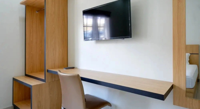 Номер Deluxe RedDoorz Syariah near Mutiara SIS Al Jufrie Airport Palu 2