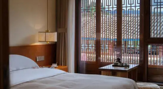 Люкс Deluxe Lijiang Lanrun Homestay (Mufu Area, South Gate of Lijiang Old Town)
