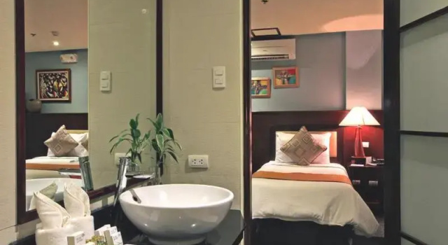 O podwyższonym standardzie trzyosobowy pokój Hotel Centro
