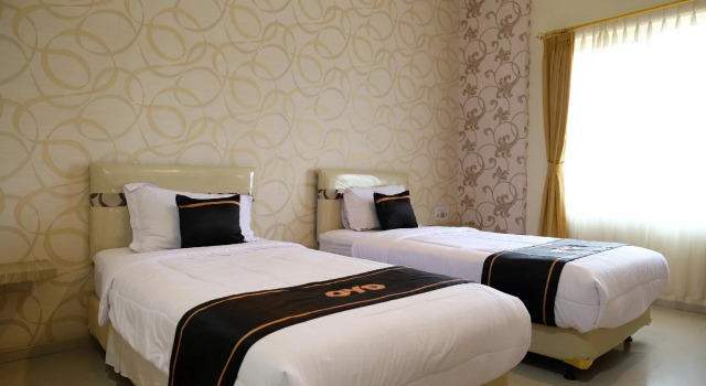 OYO 1616 Hotel Central City 2, Забронировать Отель Танджунгпандан Суматра