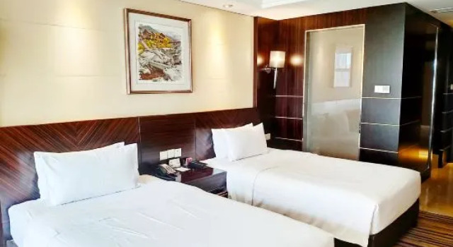 Номер Deluxe Chongqing YiMei Hotel