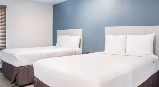 Четырёхместный люкс WoodSpring Suites Denton