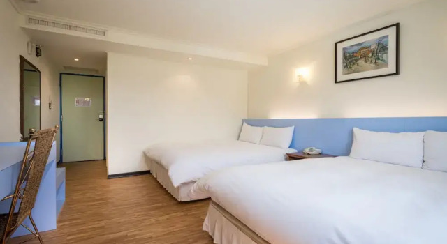 Standardowy czteroosobowy pokój Apple Hotel