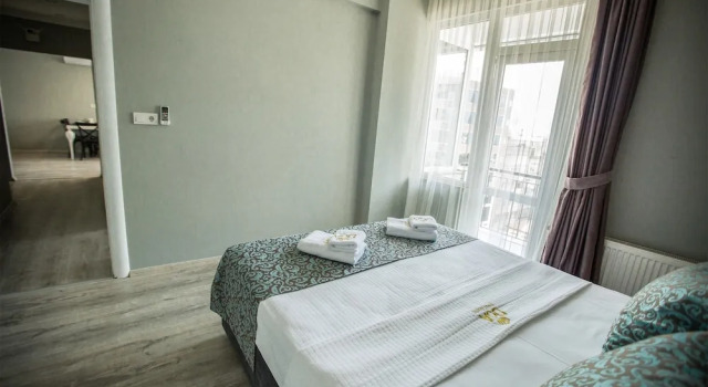 Апартаменты с 2 комнатами с балконом Doa Suite Hotel