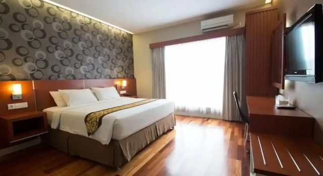 Camera Deluxe Hotel Trio Indah 2