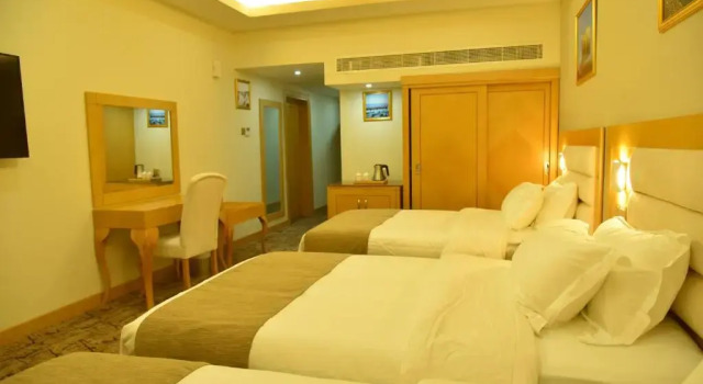 Четырёхместный номер Standard Muscat Plaza Hotel