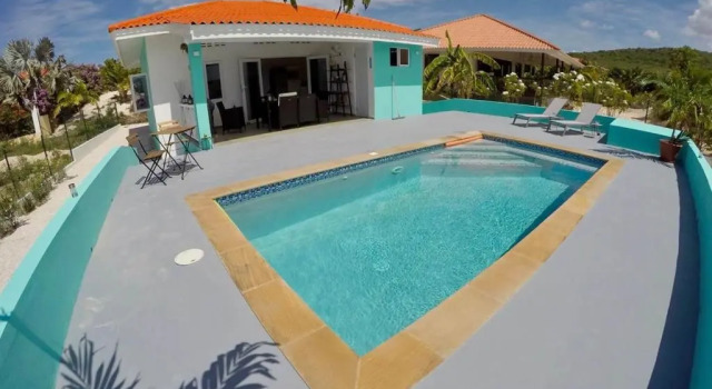 Luxury Villa, gated resort, 24/7 security, private pool, sea view.