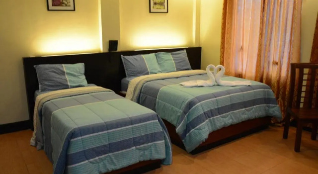 Трёхместный номер Deluxe Siayan Travellers Inn