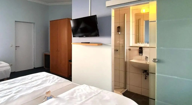 Konfor üç kişilik oda Donau-Hotel