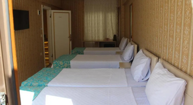 Четырёхместный номер Standard Omega Inn