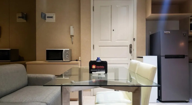 Апартаменты Minimalist And Comfy 1Br At The Boulevard Apartment