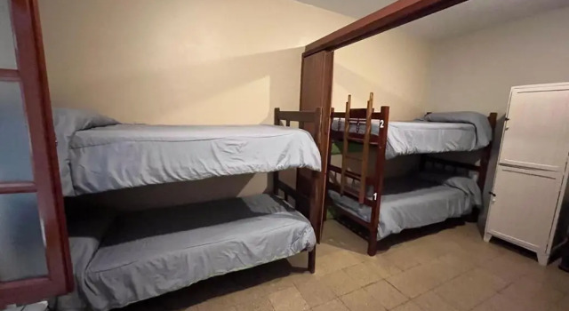 Кровать в общем номере Ferienhaus Hostel Salta