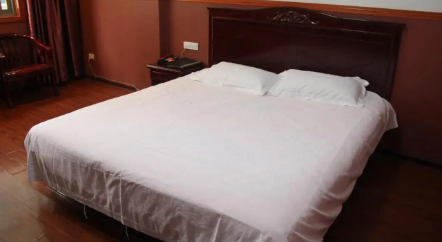 Enshi Junren Business Hotel
