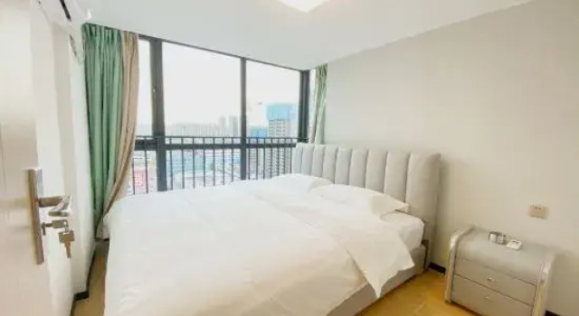 Двухместный люкс Дуплекс с 2 комнатами Dongguan Huatang Business Apartment