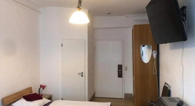Трёхместный номер Hotel Pension Schmellergarten