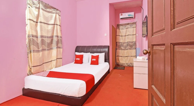 Номер Deluxe OYO 90664 Rabi Hotel