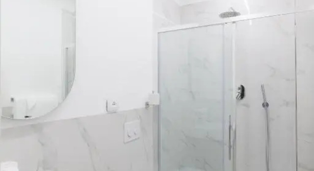 Четырёхместный номер Cuneo Hotel