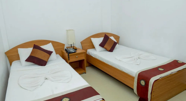 Cama en dormitorio compartido sótano Villa Hotel