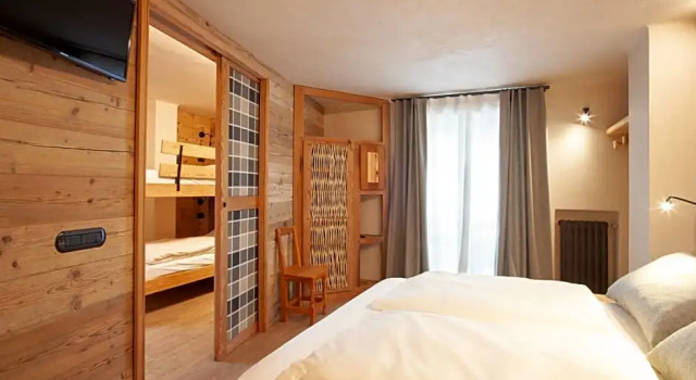 Hotel Stella Alpina, Забронировать Отель Саузе-д'Ульс Val di Susa, рядом с Горнолыжный курорт Саузе-д’Ульс - Жувансо