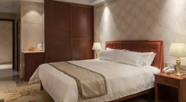 Семейный люкс c 1 комнатой Mei Zhou Guset Hotel