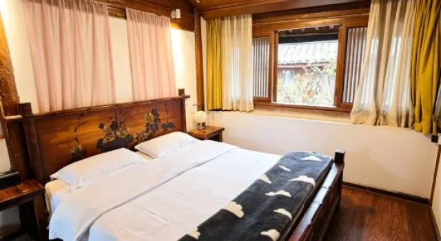 Семейный люкс с видом на сад Huamisheng Inn