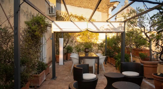 Апартаменты Habitat's Colosseum-Monti 4BR Penthouse with Terrace
