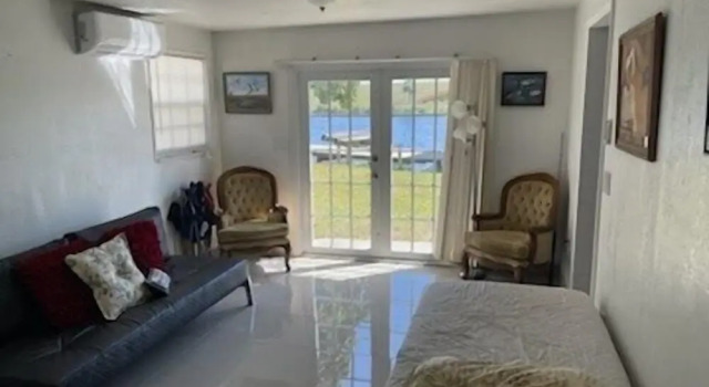 Rim Canal 'yellow House' With Canal Views & Boat Dock 1 Bedroom Cottage by RedAwning