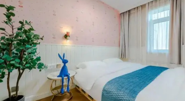 Кровать в общем номере Miomi Homestay