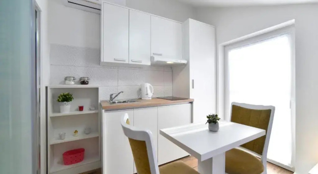 Студия Piccolo Apartments