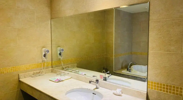Четырёхместный номер Standard East Coast Hotel