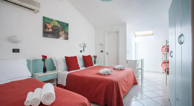 Четырёхместный номер Standard Мансарда Hotel Giove dipendenza Hotel Fiamma
